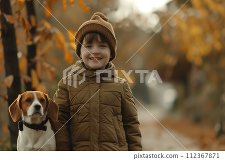 A boy with his best friend, his dog in a forest A boy with his best friend, his dog in a forest 112367871