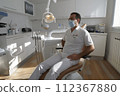 patient sitting in the chair in a dental clinic 112367880