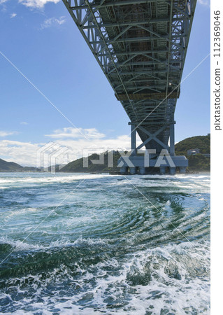 Naruto whirlpools seen from a sightseeing boat 112369046