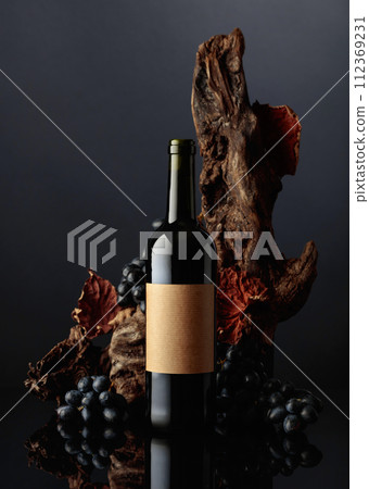 Bottle of red wine with the old empty label. Bottle of red wine with the old empty label. 112369231