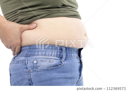 fat woman, fat belly, obese woman hand holding excessive belly fat 112369571