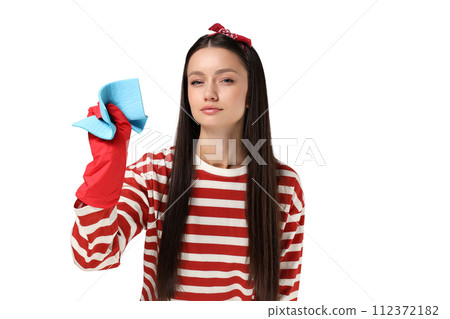Housewife girl with means for cleaning the house, on a gray background. Housewife girl with means for cleaning the house, on a gray background. 112372182