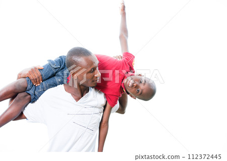 Happy father and child spending time outdoors and laughing Happy father and child spending time outdoors and laughing 112372445