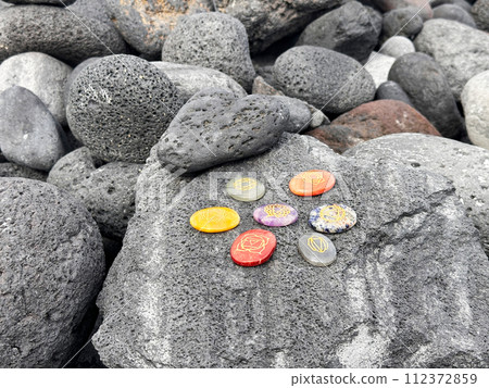 Healing crystals on brown background Healing crystals on brown background 112372859
