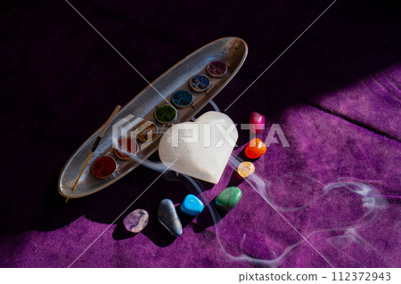 seven chakras stones, energy healing concept 112372943