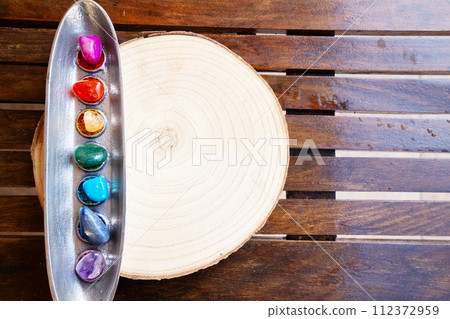 seven chakras stones, energy healing concept 112372959