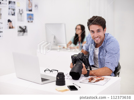 Man, pictures and portrait with laptop, camera and lens for work, shoot and editing photographs. Professional, studio office and technology with creativity, internet and equipment for videography Man, pictures and portrait with laptop, camera and lens for work, shoot and editing photographs. Professional, studio office and technology with creativity, internet and equipment for videography 112373638