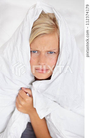 Frustrated, woman and blanket to cover in portrait on bed with anger or fatigue in home with sheet on body. Tired, girl and duvet on head of person to wake up with stress in bedroom or morning 112374179
