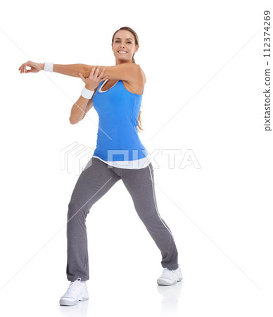 Fitness, portrait and woman stretching in studio for arm exercise, training or workout. Sports, health and young female person with muscle warm up for wellness activity isolated by white background. 112374269