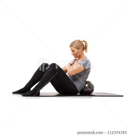 Fitness, sit up and woman on floor with ball for pilates, body care and health in studio. Gym, training and girl on mat with cardio, energy and muscle workout on ground isolated on white background. Fitness, sit up and woman on floor with ball for pilates, body care and health in studio. Gym, training and girl on mat with cardio, energy and muscle workout on ground isolated on white background. 112374765