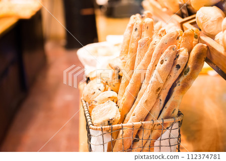 French baguette and bread in basket French baguette and bread in basket 112374781
