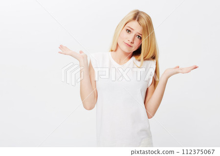 Space, confused or woman in portrait unsure, doubt or wondering isolated on white background. Person asking, dont know hand gesture or puzzled model with decision, choice or question on studio mockup Space, confused or woman in portrait unsure, doubt or wondering isolated on white background. Person asking, dont know hand gesture or puzzled model with decision, choice or question on studio mockup 112375067