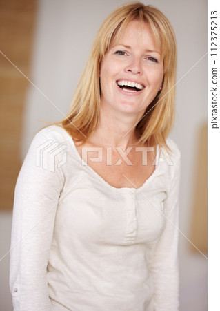 Happy woman, laugh and playful with hands on face, morning and alone in home, natural beauty. Female, beautiful and thinking with idea, mature person and cheerful lady in house or blonde hair Happy woman, laugh and playful with hands on face, morning and alone in home, natural beauty. Female, beautiful and thinking with idea, mature person and cheerful lady in house or blonde hair 112375213