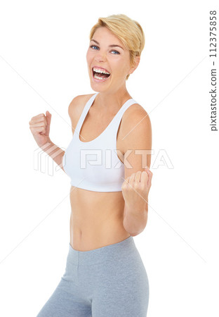 Woman, portrait and success in studio for fitness achievement, training and victory on white background. Workout model, person and winner fist for health, exercise and wellness on mockup backdrop 112375858