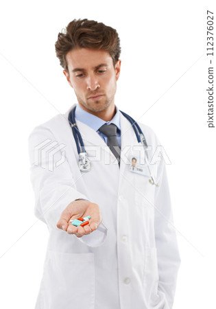 Doctor, man and prescription of pills in studio, wellness medication and healthcare in pharmaceuticals. Pharmacist, face and serious in medicine support, advice tablets and drugs by white background 112376027