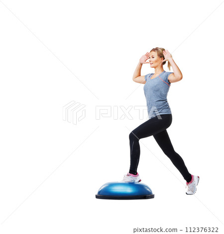 Woman, bosu ball and stepping for exercise, workout or fitness on a white studio background. Young active female person or athlete on half round object in pilates, health and wellness on mockup space 112376322