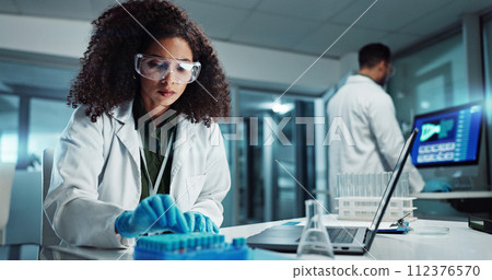 Woman, scientist or blood vial for exam in laboratory, healthcare or pathology to label on test tube. Biotechnology, pharmaceutical and laptop by doctor and online scientific results in phlebotomy Woman, scientist or blood vial for exam in laboratory, healthcare or pathology to label on test tube. Biotechnology, pharmaceutical and laptop by doctor and online scientific results in phlebotomy 112376570