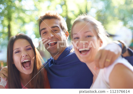 Portrait, friends and excited at music festival in nature, bonding and celebration with social fun in forest. Man, women and happy face in hug for care, camping and outdoor adventure in denmark woods Portrait, friends and excited at music festival in nature, bonding and celebration with social fun in forest. Man, women and happy face in hug for care, camping and outdoor adventure in denmark woods 112376614