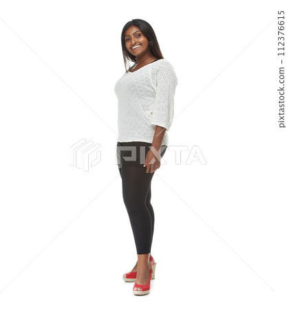 Indian woman, fashion and portrait in studio with style, pride and trendy outfit by white background. Girl, person or model with edgy clothes, smile and happy for confidence, excited and casual shirt Indian woman, fashion and portrait in studio with style, pride and trendy outfit by white background. Girl, person or model with edgy clothes, smile and happy for confidence, excited and casual shirt 112376615