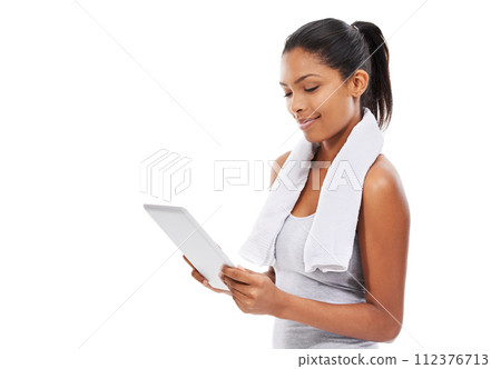 Exercise, internet and woman with tablet, healthy and smile isolated on a white studio background. Person, girl and model with tech, connection and online with information, wellness, fitness or towel Exercise, internet and woman with tablet, healthy and smile isolated on a white studio background. Person, girl and model with tech, connection and online with information, wellness, fitness or towel 112376713