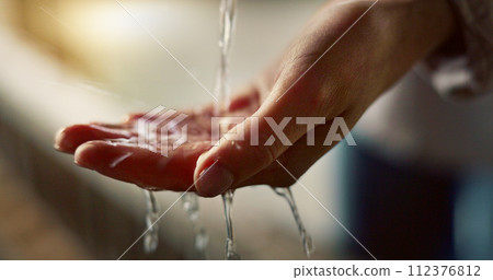 Closeup, wash hands and water for cleaning, hygiene and health for safety, immune system or germs. Person, splash and drop of liquid for wellness, zoom and stop bacteria in home for body in Tokyo Closeup, wash hands and water for cleaning, hygiene and health for safety, immune system or germs. Person, splash and drop of liquid for wellness, zoom and stop bacteria in home for body in Tokyo 112376812
