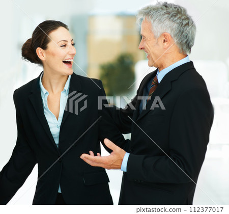 Employee, laughing and meeting with boss in office for business in corporate company for strategy. Woman, happy and talking to leader of workplace in professional clothes for work or job for teamwork Employee, laughing and meeting with boss in office for business in corporate company for strategy. Woman, happy and talking to leader of workplace in professional clothes for work or job for teamwork 112377017