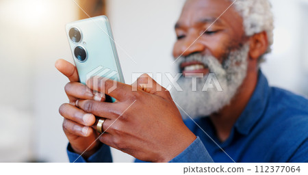 Happy senior black man, phone and typing for communication, social media or networking at home. Face of mature African male person, smile and hands on mobile smartphone for online chatting or texting Happy senior black man, phone and typing for communication, social media or networking at home. Face of mature African male person, smile and hands on mobile smartphone for online chatting or texting 112377064