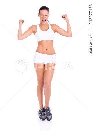 Woman, fitness and portrait with celebration in studio for workout, athletic and active lifestyle for healthy slim body. Personal trainer, success and strong for fit figure with white background 112377128