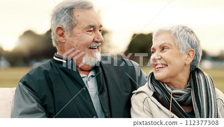 Face, love and smile with a senior couple outdoor in a park together for a romantic date during retirement. Portrait, happy or care with an elderly man and woman bonding in a garden for romance 112377308