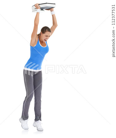 Angry woman, weight loss and throwing scale on ground isolated on a white studio background. Frustrated female person upset with body, disappointment or furious from diet or breakdown on mockup space 112377531