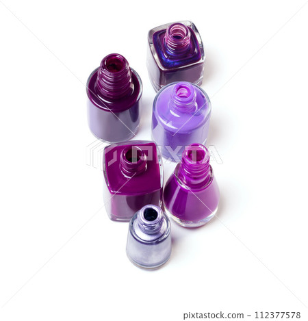 Nail polish, purple color and bottle on a white background for beauty, cosmetics and salon products. Cosmetology, luxury spa and isolated jar for painting for manicure, pedicure and pamper in studio Nail polish, purple color and bottle on a white background for beauty, cosmetics and salon products. Cosmetology, luxury spa and isolated jar for painting for manicure, pedicure and pamper in studio 112377578