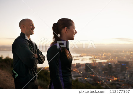 Happy couple, fitness and vision with city on mountain for dream, ambition or outdoor workout in nature. Young man and woman with smile for view of town in exercise or training together on cliff Happy couple, fitness and vision with city on mountain for dream, ambition or outdoor workout in nature. Young man and woman with smile for view of town in exercise or training together on cliff 112377597
