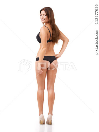 Woman, portrait and underwear confidence in studio for natural beauty, empowerment smile or white background. Female person, model and lingerie or bra for sensual feminine look, happy in high heels 112377636