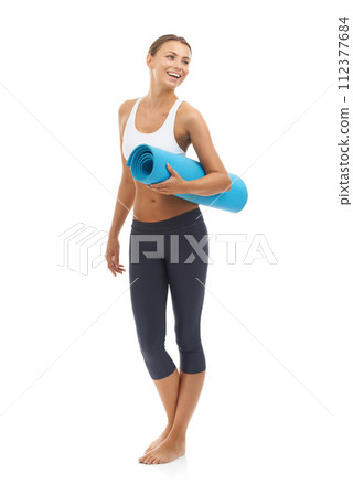 Woman, yoga mat and health fitness in studio for muscle flexibility, exercise or training. Female person, pilates and white background for mockup space or self care wellness, performance or strong Woman, yoga mat and health fitness in studio for muscle flexibility, exercise or training. Female person, pilates and white background for mockup space or self care wellness, performance or strong 112377684