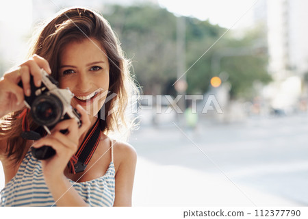 Happy woman, portrait and photography with camera in city street for photo, memory or outdoor moment. Female person, tourist or photographer with smile or lens for picture or sightseeing in town 112377790