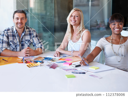Portrait, smile and group of business people at table in meeting together, cooperation or collaboration in startup. Happy face, creative team or designers at desk, diversity or brainstorming strategy Portrait, smile and group of business people at table in meeting together, cooperation or collaboration in startup. Happy face, creative team or designers at desk, diversity or brainstorming strategy 112378006