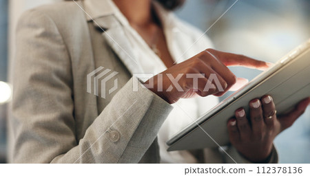 Tablet, night and hands of business person typing, scroll or check social network feedback, communication or customer experience. Research, closeup and corporate boss working on online data analysis Tablet, night and hands of business person typing, scroll or check social network feedback, communication or customer experience. Research, closeup and corporate boss working on online data analysis 112378136