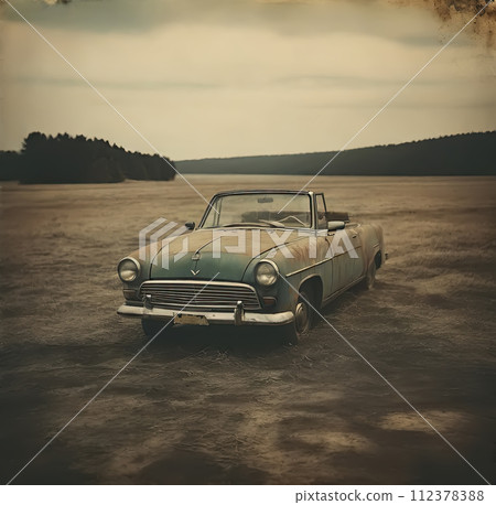 Retro car on a field. Vintage toned image. 112378388