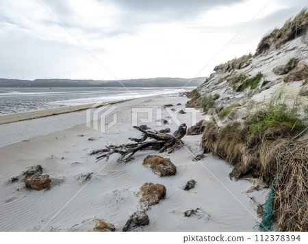 Sand storm at Dooey beach by Lettermacaward in County Donegal - Ireland Sand storm at Dooey beach by Lettermacaward in County Donegal - Ireland 112378394