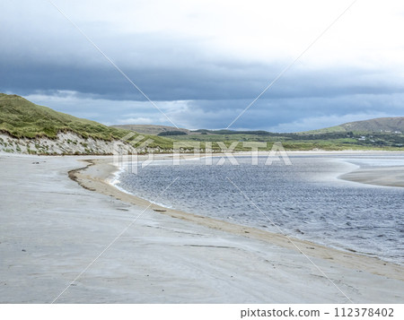 Sand storm at Dooey beach by Lettermacaward in County Donegal - Ireland Sand storm at Dooey beach by Lettermacaward in County Donegal - Ireland 112378402