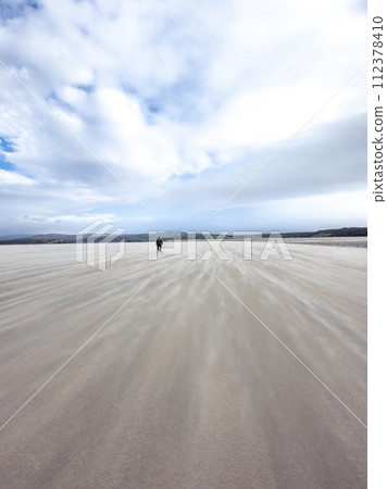 Sand storm at Dooey beach by Lettermacaward in County Donegal - Ireland 112378410