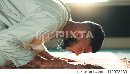 Islamic prayer man on mat in mosque with mindfulness, love and gratitude in faith commitment. Worship, religion and Muslim person in holy temple for praise, spiritual teaching and meditation peace. 112378583