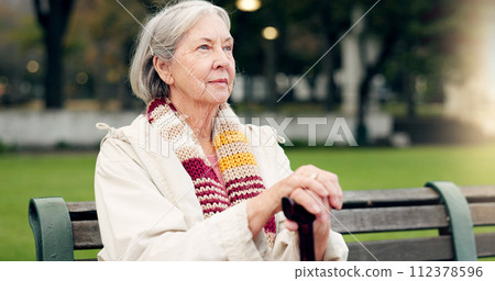 Relax, thinking and a senior woman at the park for summer, ideas or retirement vision. Smile, remember and an elderly person on a bench in nature with inspiration, memory or outdoor reflection 112378596