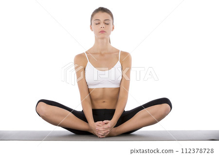 Woman, meditation and yoga for healthy wellness in studio for mindful practice or spiritual, calm or white background. Female person, eyes closed and mockup for posture zen, holistic or stress relief 112378728