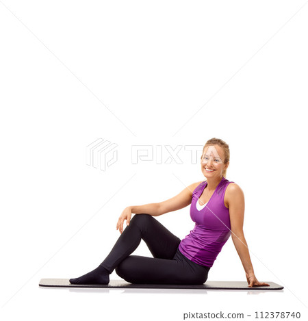 Fitness, happy woman and portrait on floor in studio for exercise, healthy workout and performance on white background. Wellness, power and lady smile on mat for yoga, strong body and mockup space Fitness, happy woman and portrait on floor in studio for exercise, healthy workout and performance on white background. Wellness, power and lady smile on mat for yoga, strong body and mockup space 112378740