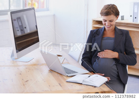 Happy business woman, pregnant and office with laptop in joy for motherhood at workplace. Female person or employee touching stomach or tummy with smile for pregnancy by computer desk in maternity Happy business woman, pregnant and office with laptop in joy for motherhood at workplace. Female person or employee touching stomach or tummy with smile for pregnancy by computer desk in maternity 112378982