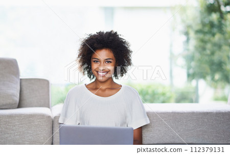 Portrait, laptop and African woman in lounge, smile and online shopping from home. Internet, ecommerce and shopping for fashion clothing, browsing and connected for happy female with natural afro Portrait, laptop and African woman in lounge, smile and online shopping from home. Internet, ecommerce and shopping for fashion clothing, browsing and connected for happy female with natural afro 112379131
