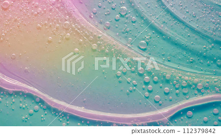 Close-up of transparent and colorful liquid (AI generated image) 112379842