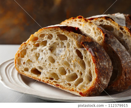 Rye bread crumb with lots of air bubbles Rye bread crumb with lots of air bubbles 112379915