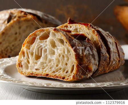 Rye bread crumb with lots of air bubbles Rye bread crumb with lots of air bubbles 112379916